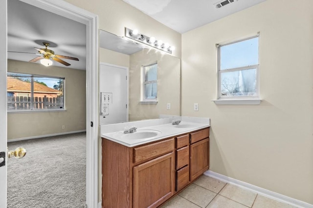 3609 Mims Cv, Austin, TX 78725 - bathroom featuring double vanity and a ceiling fan