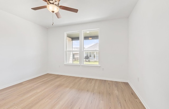 121 Crossbar St, Georgetown, TX 78633 - empty room featuring light wood-style floors, baseboards, and ceiling fan