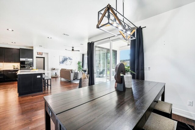 405 Rio, Horseshoe Bay, TX 78657 - dining room with dark wood-type flooring and recessed lighting