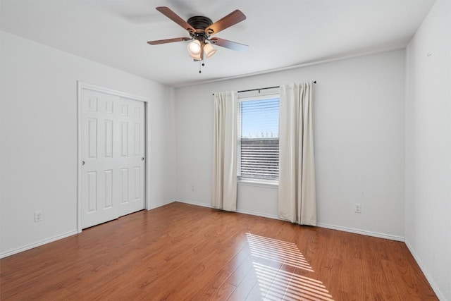 18037 Basket Flower Bnd, Elgin, TX 78621 - spare room with a ceiling fan and wood finished floors