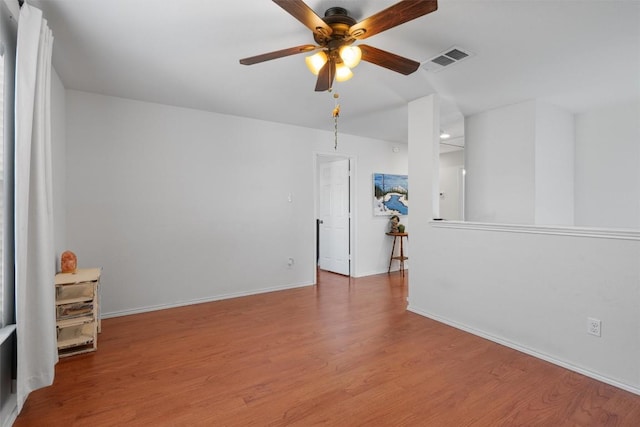 18037 Basket Flower Bnd, Elgin, TX 78621 - unfurnished room featuring ceiling fan, wood finished floors, and baseboards