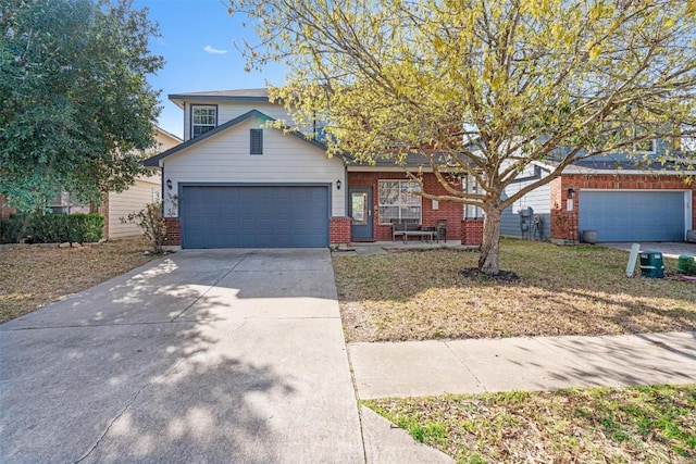 view of front of house featuring concrete driveway, brick siding, and an attached garage
