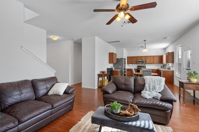18037 Basket Flower Bnd, Elgin, TX 78621 - living area with wood finished floors and a ceiling fan
