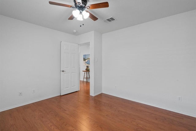 18037 Basket Flower Bnd, Elgin, TX 78621 - unfurnished room featuring a ceiling fan and wood finished floors