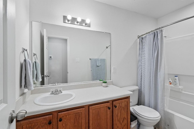 bathroom with shower / bath combination with curtain, vanity, and toilet