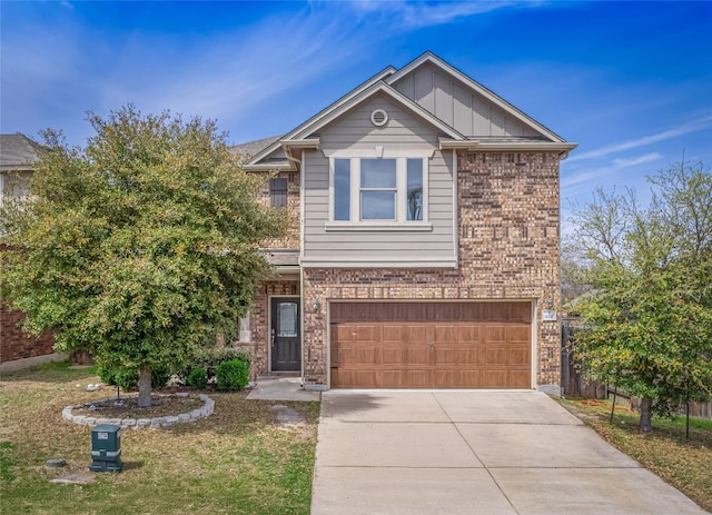 670 Landon Samuel Loop, Pflugerville, TX 78660 - view of front of house featuring concrete driveway, an attached garage, brick siding, and board and batten siding