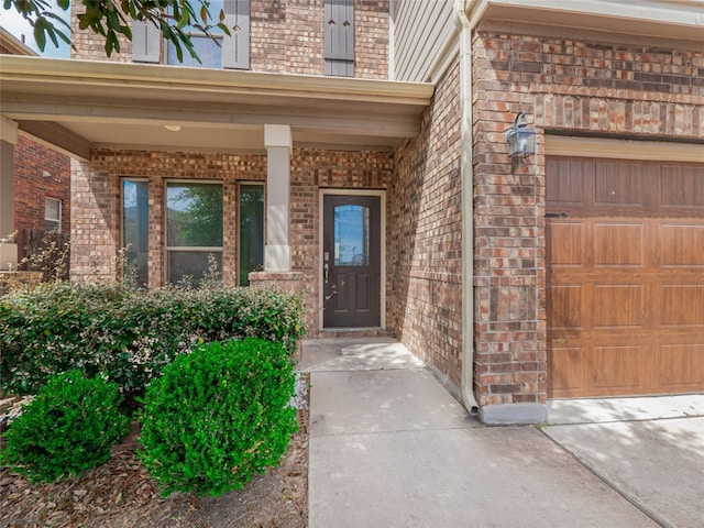 670 Landon Samuel Loop, Pflugerville, TX 78660 - view of exterior entry with brick siding and a porch