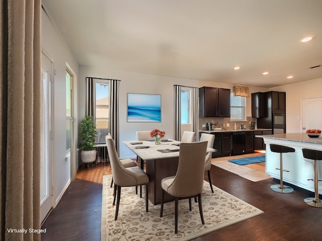 670 Landon Samuel Loop, Pflugerville, TX 78660 - dining room with wood finished floors and recessed lighting
