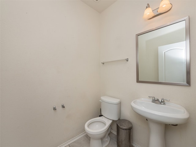 670 Landon Samuel Loop, Pflugerville, TX 78660 - half bathroom featuring toilet and tile patterned flooring