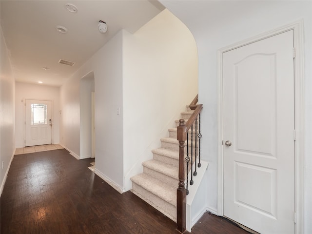 670 Landon Samuel Loop, Pflugerville, TX 78660 - entryway with arched walkways, wood finished floors, and stairs