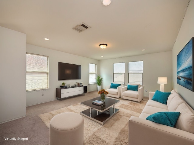 670 Landon Samuel Loop, Pflugerville, TX 78660 - living room with light colored carpet and recessed lighting