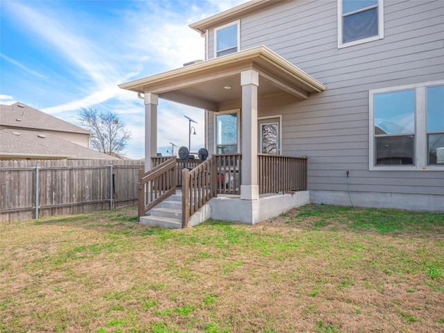 670 Landon Samuel Loop, Pflugerville, TX 78660 - rear view of property with a fenced backyard and a porch