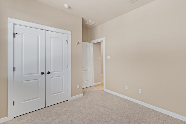 4706 Madrid Dr, Georgetown, TX 78628 - unfurnished bedroom with light colored carpet, baseboards, and a closet