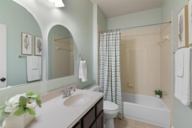 4706 Madrid Dr, Georgetown, TX 78628 - full bath featuring vanity, toilet, shower / tub combo, and tile patterned flooring