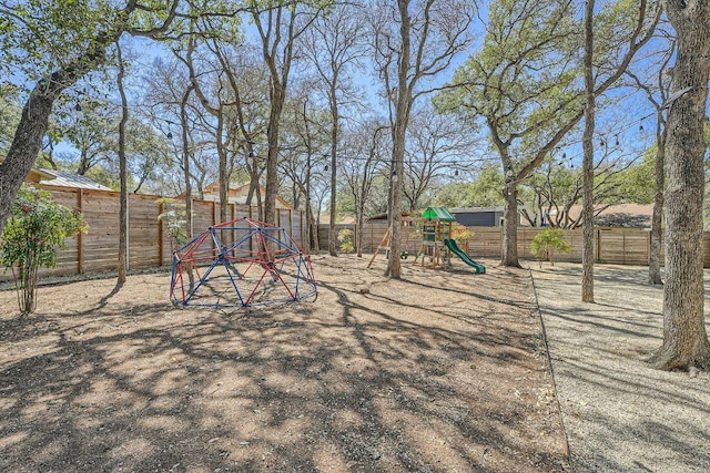 view of jungle gym featuring a fenced backyard