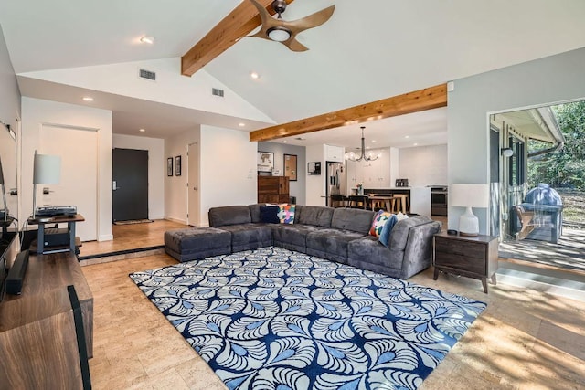 living room with beamed ceiling, baseboards, visible vents, and ceiling fan with notable chandelier