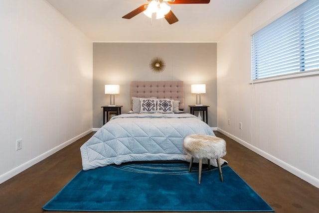 bedroom with baseboards and a ceiling fan