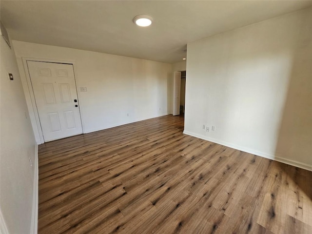 6903 Deatonhill Dr Unit 2, Austin, TX 78745 - empty room with wood finished floors and baseboards