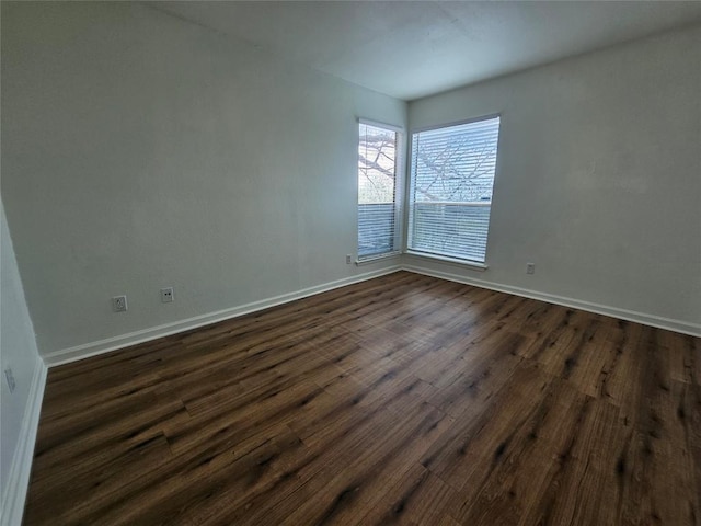 6903 Deatonhill Dr Unit 2, Austin, TX 78745 - unfurnished room with dark wood-type flooring and baseboards