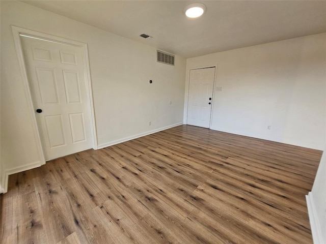 6903 Deatonhill Dr Unit 2, Austin, TX 78745 - unfurnished room with wood finished floors