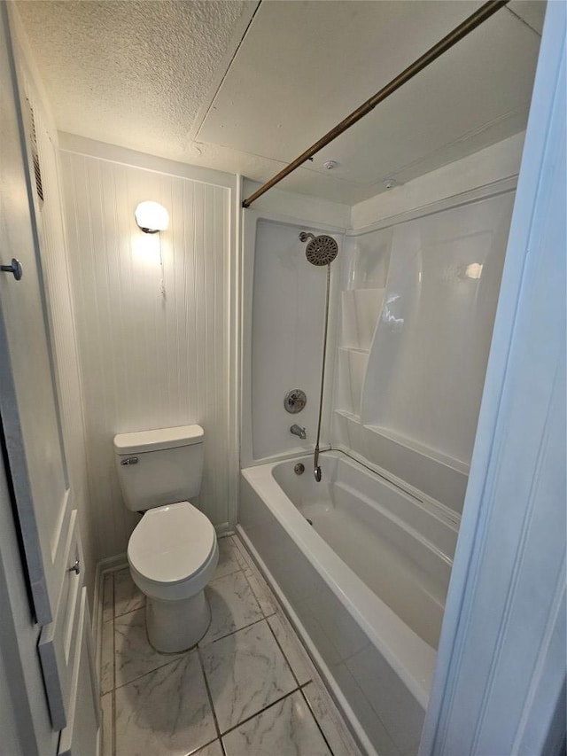 6903 Deatonhill Dr Unit 2, Austin, TX 78745 - full bathroom featuring marble look tile flooring,  shower combination, and a textured ceiling