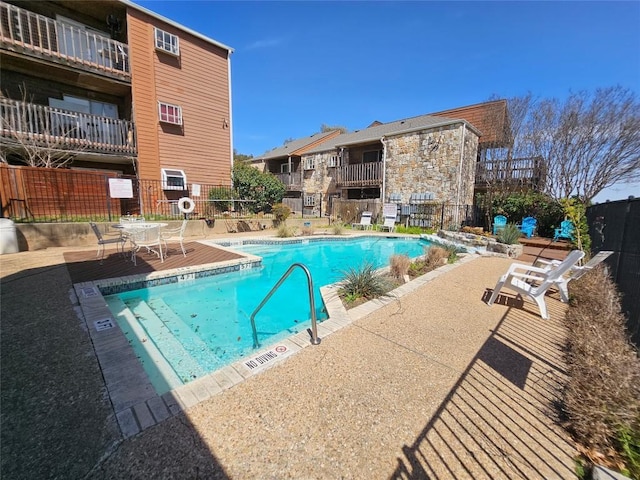 6903 Deatonhill Dr Unit 2, Austin, TX 78745 - community pool featuring a patio