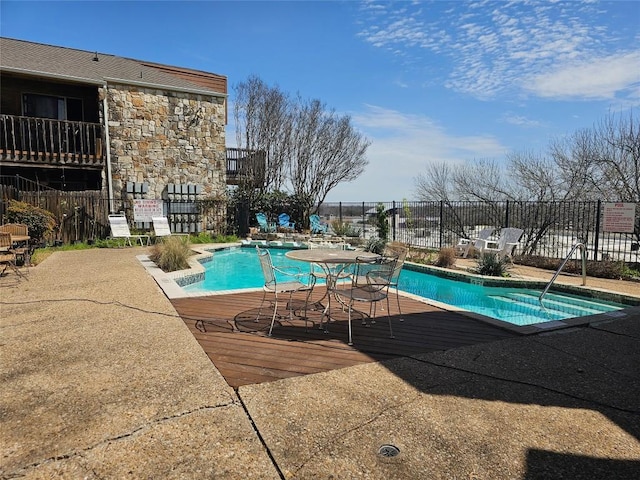 6903 Deatonhill Dr Unit 2, Austin, TX 78745 - community pool featuring a wooden deck and a patio