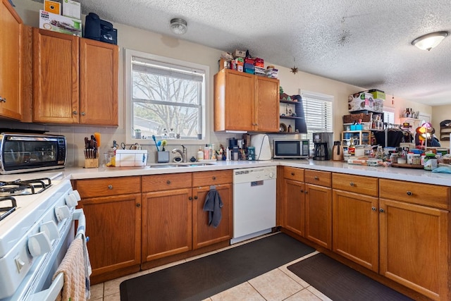 1513 Ruth Ave, Austin, TX 78757 - kitchen featuring white appliances, open shelves, a toaster, a sink, and light countertops