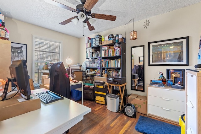 1513 Ruth Ave, Austin, TX 78757 - office area featuring a textured ceiling, ceiling fan, and dark wood finished floors