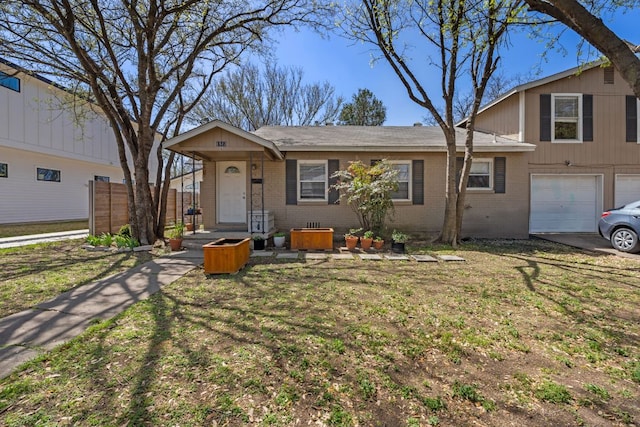 1513 Ruth Ave, Austin, TX 78757 - tri-level home with a garage and brick siding