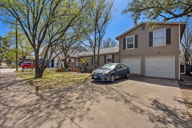 1513 Ruth Ave, Austin, TX 78757 - split level home with concrete driveway and a garage