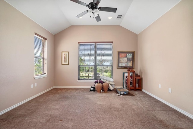 149 Colovista Dr, Bastrop, TX 78602 - recreation room featuring ceiling fan, healthy amount of natural light, carpet floors, and lofted ceiling
