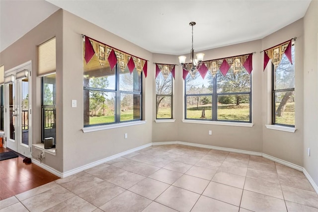 149 Colovista Dr, Bastrop, TX 78602 - unfurnished dining area featuring a chandelier and light tile patterned floors
