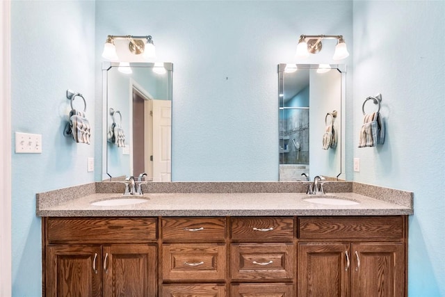 149 Colovista Dr, Bastrop, TX 78602 - bathroom with double vanity and a shower