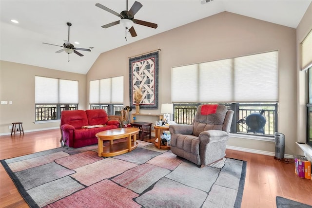 149 Colovista Dr, Bastrop, TX 78602 - living area with ceiling fan, wood finished floors, high vaulted ceiling, and recessed lighting