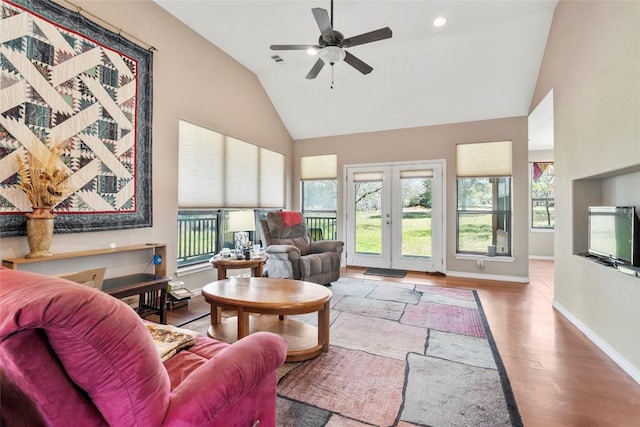 149 Colovista Dr, Bastrop, TX 78602 - living room featuring high vaulted ceiling, a ceiling fan, wood finished floors, french doors, and recessed lighting