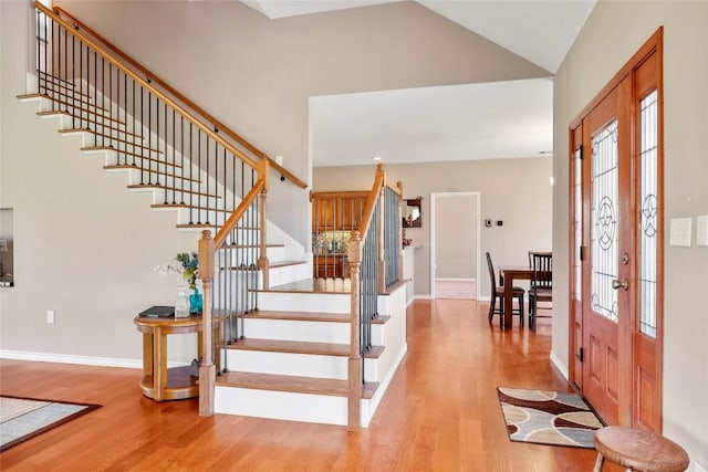 149 Colovista Dr, Bastrop, TX 78602 - foyer entrance with stairway and wood finished floors