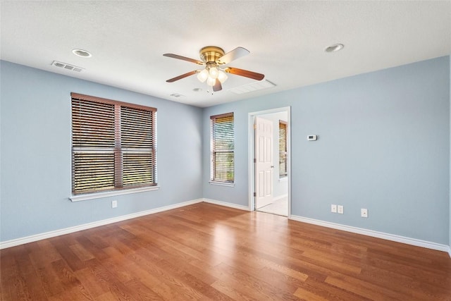 149 Colovista Dr, Bastrop, TX 78602 - empty room featuring ceiling fan and wood finished floors