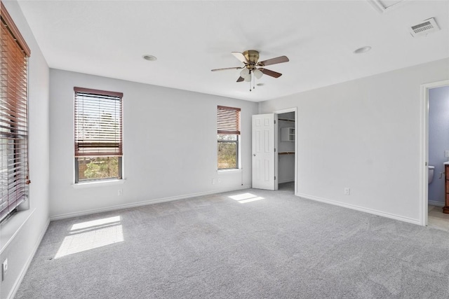 149 Colovista Dr, Bastrop, TX 78602 - unfurnished bedroom with carpet flooring, a ceiling fan, and ensuite bathroom
