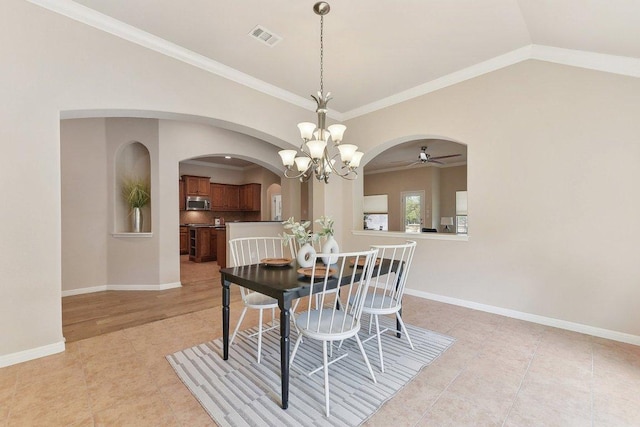 2812 Prosperity, Leander, TX 78641 - dining space with arched walkways, ceiling fan, a chandelier, light tile patterned floors, and vaulted ceiling