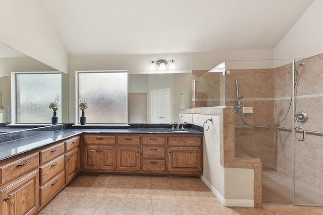 2812 Prosperity, Leander, TX 78641 - full bathroom with a tile shower, double vanity, lofted ceiling, and tile patterned flooring