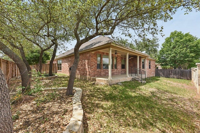 2812 Prosperity, Leander, TX 78641 - view of property exterior with brick siding and a ceiling fan