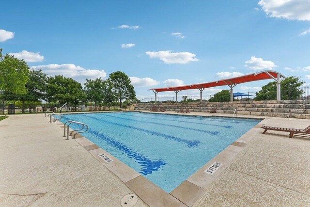 2812 Prosperity, Leander, TX 78641 - community pool featuring a patio area
