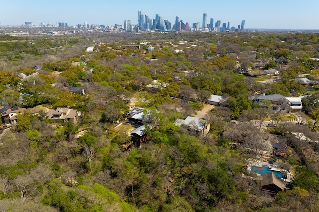 birds eye view of property featuring a city view