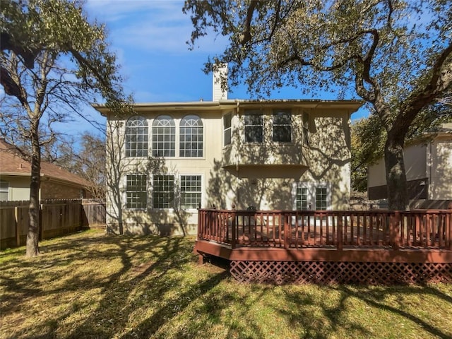 2119 Simbrah Dr, Cedar Park, TX 78613 - back of property with a wooden deck and a chimney