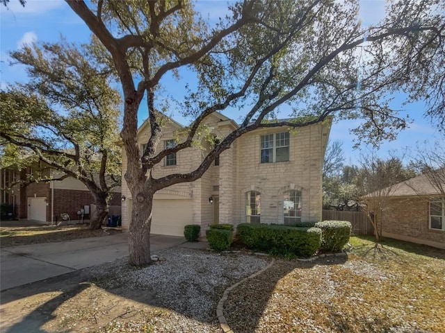 2119 Simbrah Dr, Cedar Park, TX 78613 - traditional home featuring driveway, a garage, stone siding, and brick siding