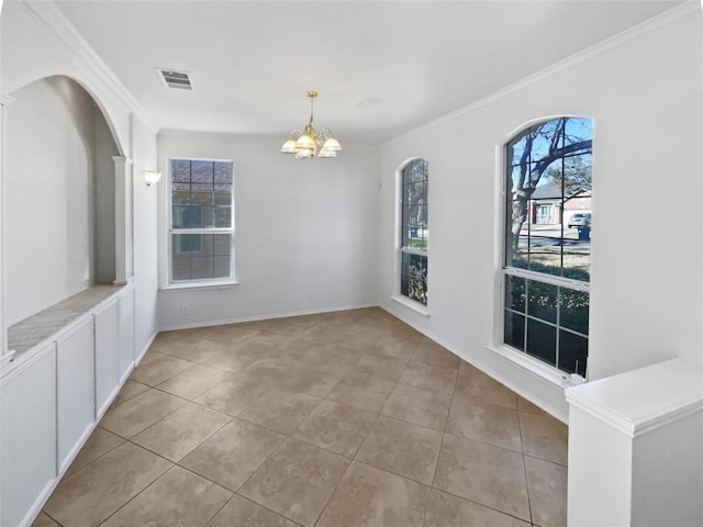 2119 Simbrah Dr, Cedar Park, TX 78613 - unfurnished dining area featuring tile patterned flooring, a chandelier, and crown molding