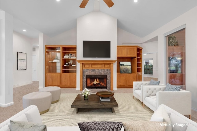 201 Lasso, Horseshoe Bay, TX 78657 - living room with light colored carpet, a ceiling fan, a high end fireplace, recessed lighting, and high vaulted ceiling