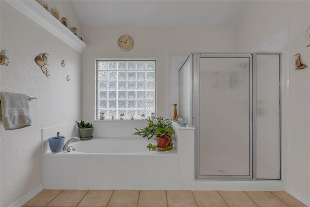 201 Lasso, Horseshoe Bay, TX 78657 - full bath featuring a stall shower, a garden tub, and tile patterned floors