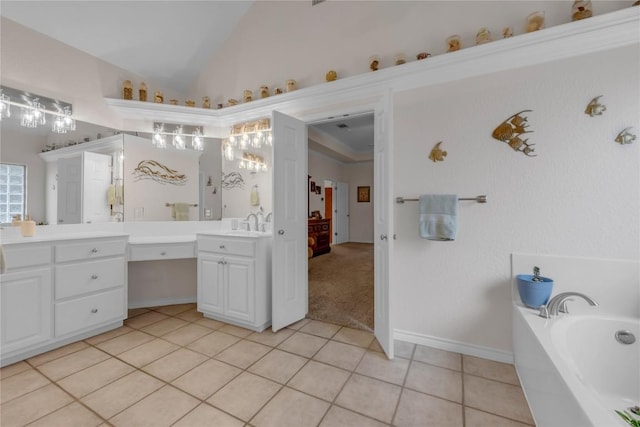 201 Lasso, Horseshoe Bay, TX 78657 - full bathroom featuring double vanity, a garden tub, tile patterned floors, and lofted ceiling